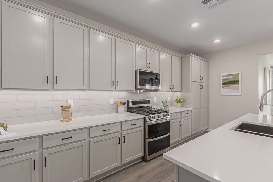 Representative furnished interior of a home built from the Granite Vista Avanti - Plan 2028 by Elliott Homes in Avanti at Granite Vista, Waddell (Image 11).