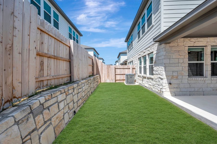 Exterior details and patio area of a home in Park Central, Georgetown (Image 30).