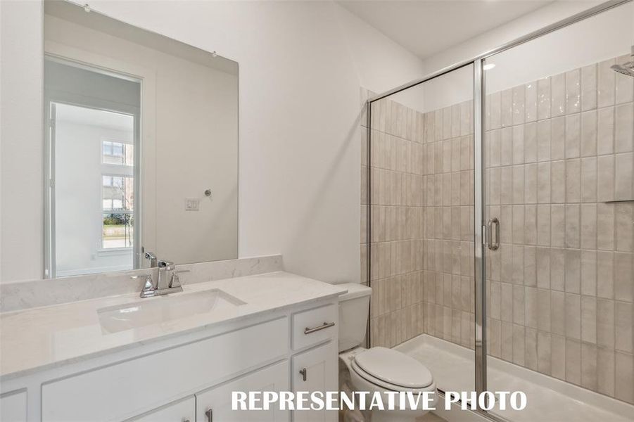 Friends and family will feel right at home in either of the beautfully finished guest baths offered in our Chapelle plan.  REPRESENTATIVE PHOTO