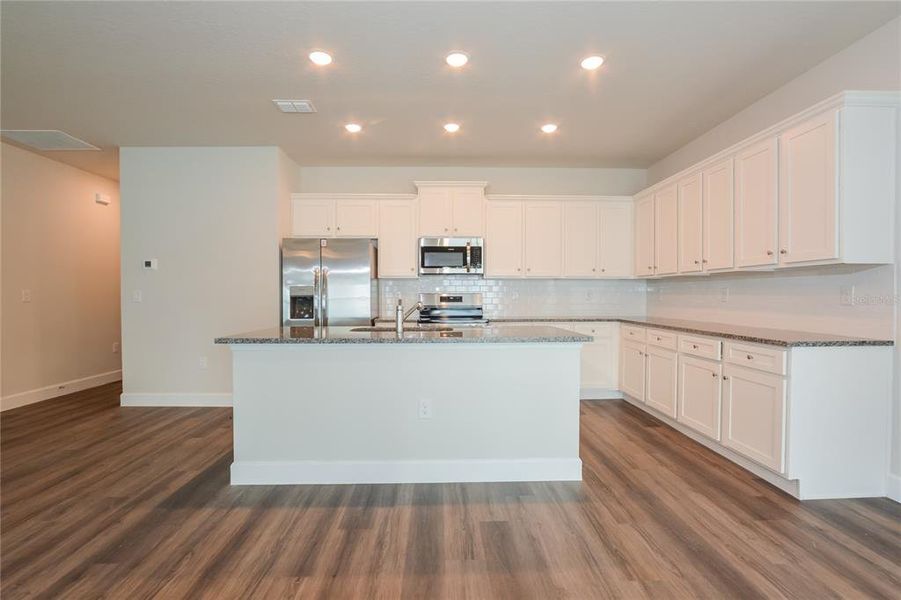 Furnished interior view inside a new home in , North Port (Image 7).
