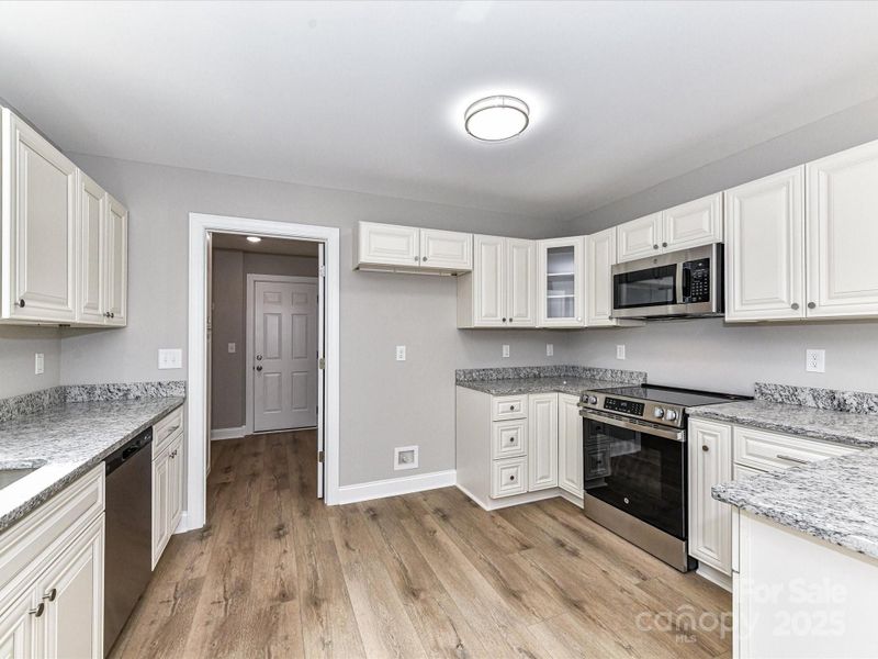 Furnished interior view inside a new home in , Oakboro (Image 4).