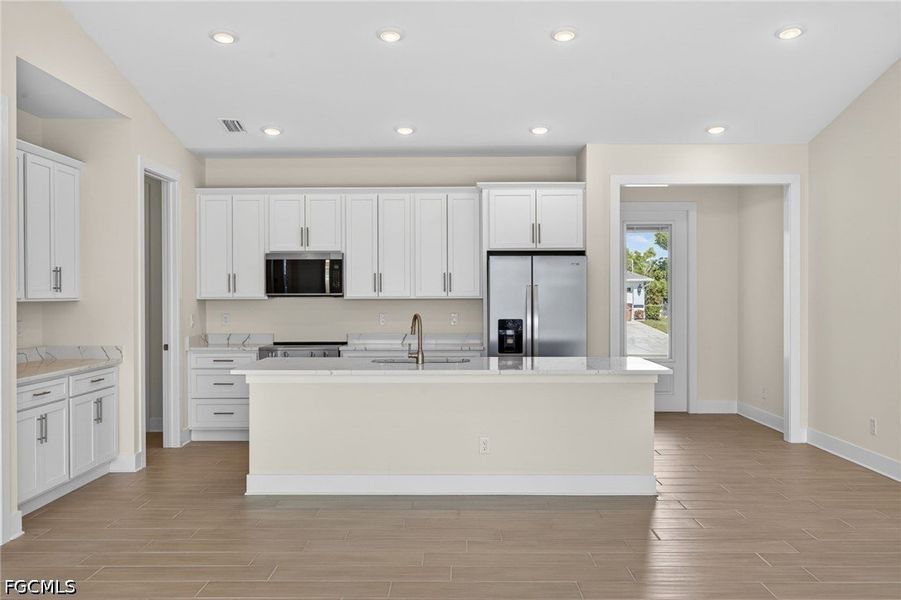 Furnished interior view inside a new home in Cape Coral, Cape Coral (Image 9). Furnished interior view inside a new home in Cape Coral, Cape Coral (Image 9).