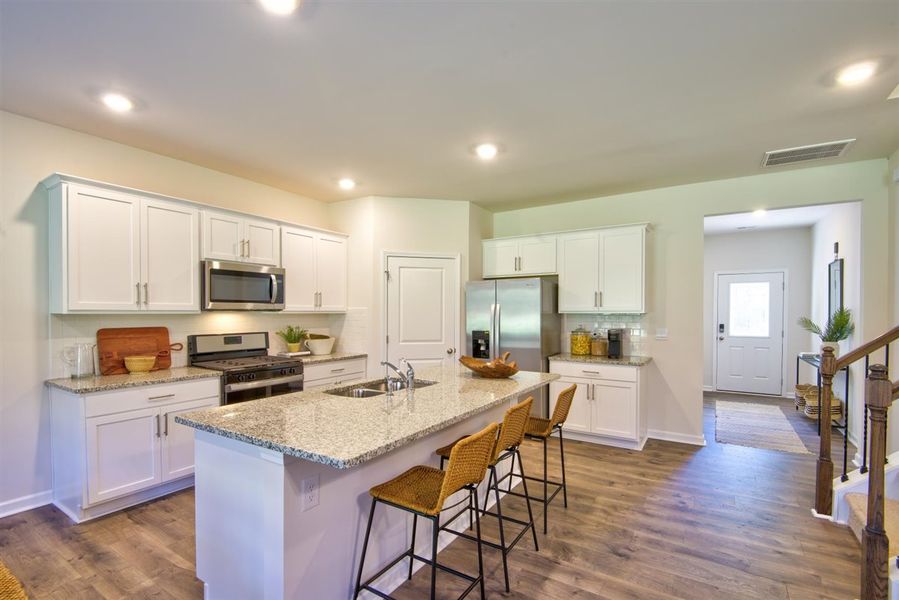 Representative furnished interior of a home built from the HAYDEN by D.R. Horton in Raven Ridge, Lexington (Image 12).