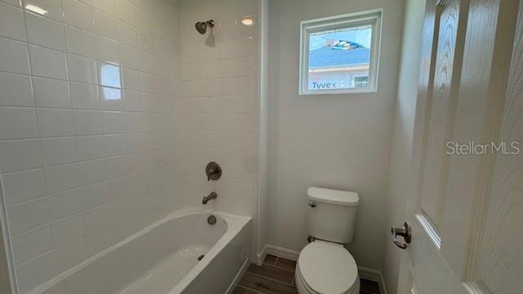 Furnished interior view inside a new home in Cypress Bluff, Groveland (Image 9).