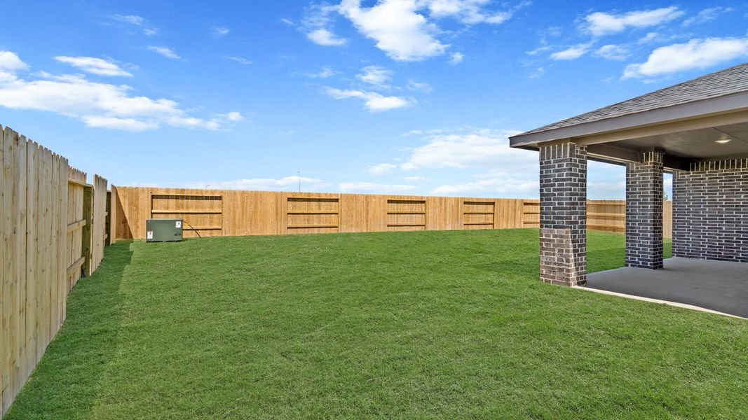 Exterior details and patio area of a home in Sunterra Lakes, Brookshire (Image 4). Exterior details and patio area of a home in Sunterra Lakes, Brookshire (Image 4).