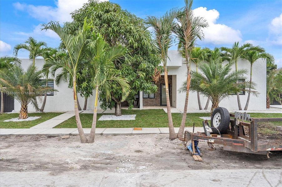 Front exterior of a new home in , Hialeah, FL, highlighting curb appeal (Image 1).