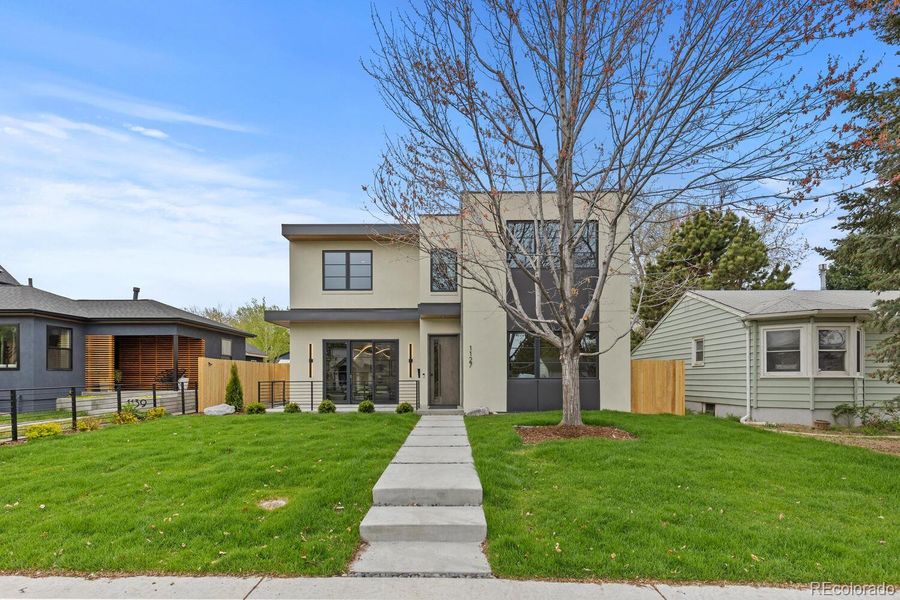 Front exterior of a new home in , Denver, CO, highlighting curb appeal (Image 24).