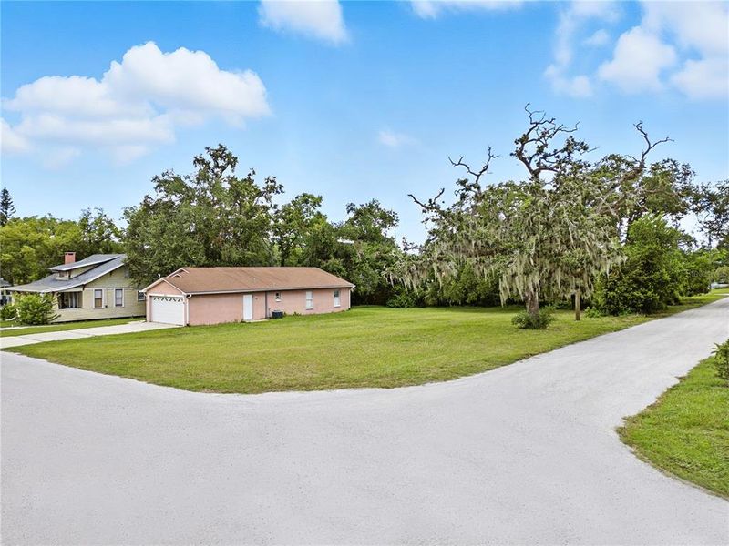 Front exterior of a new home in , Tampa, FL, highlighting curb appeal (Image 8).