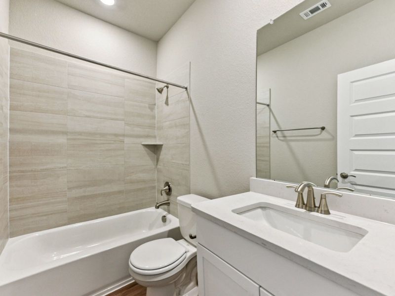 Furnished interior view inside a new home in Big Sky Ranch - Executive Collection, Dripping Springs (Image 5).