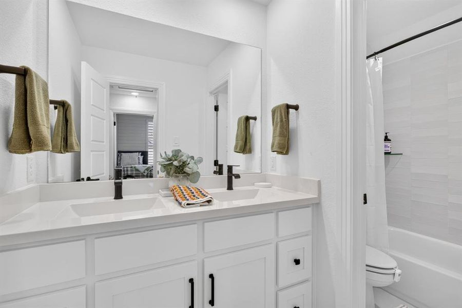 And finally - another well appointed bath with DUAL sinks, hardware, and a separate wet area. Just the best details in this home. And finally - another well appointed bath with DUAL sinks, hardware, and a separate wet area. Just the best details in this home.