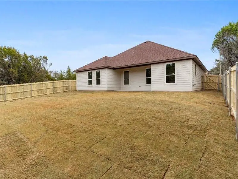 Exterior details and patio area of a home in , Granbury (Image 4).
