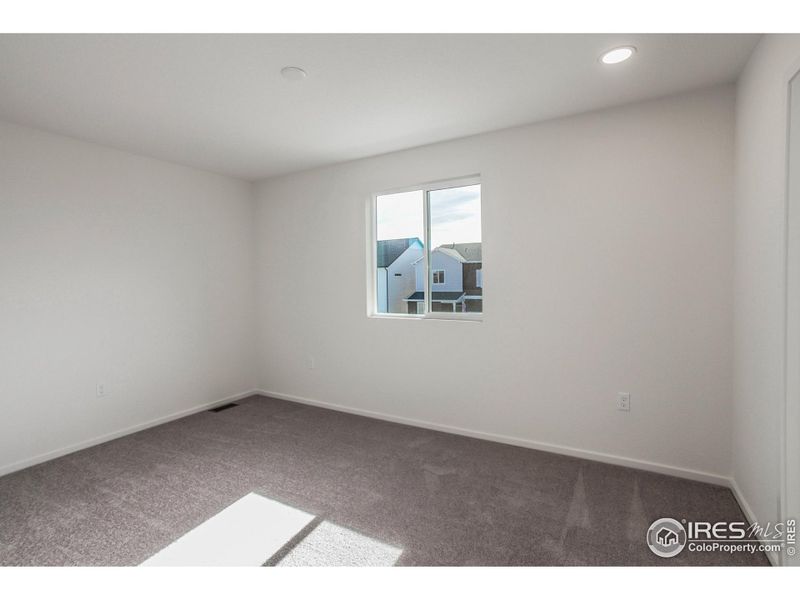 Spacious, unfurnished interior of a new home in Bloom Trailblazer Collection - Single Family Homes, Fort Collins (Image 29).