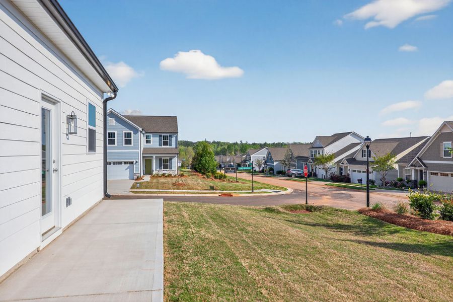 Exterior details and patio area of a home in Edgewater - Cottage Greens, Lancaster (Image 3).
