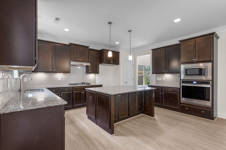 Representative furnished interior of a home built from the Fairfield Lux by Keystone Homes NC in Weybridge, Burlington (Image 13).