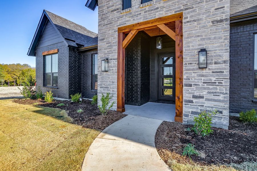 Representative exterior details of a home built from the The Colin by Elmwood Custom Homes in Matthews Farm, Venus (Image 10). Representative exterior details of a home built from the The Colin by Elmwood Custom Homes in Matthews Farm, Venus (Image 10).