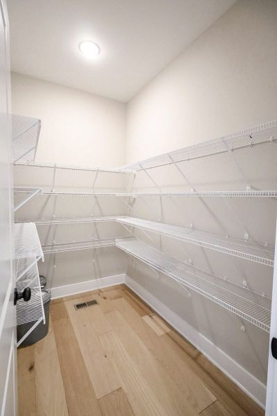 Spacious, unfurnished interior of a new home in Baker Road, Birchwood (Image 57).