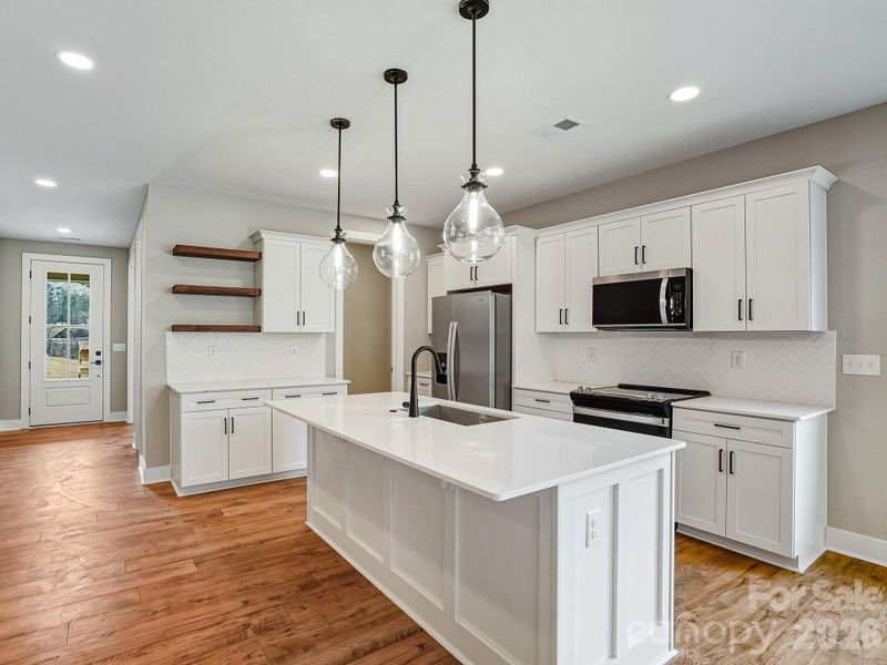 Furnished interior view inside a new home in , Weaverville (Image 13).