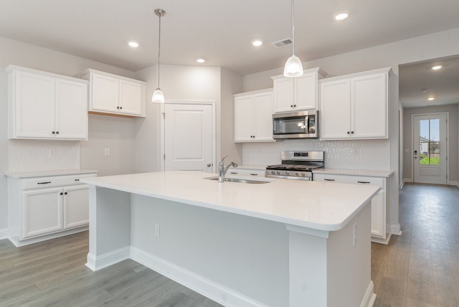 Representative furnished interior of a home built from the DARBY by D.R. Horton in Brunswick Plantation, Calabash (Image 14).