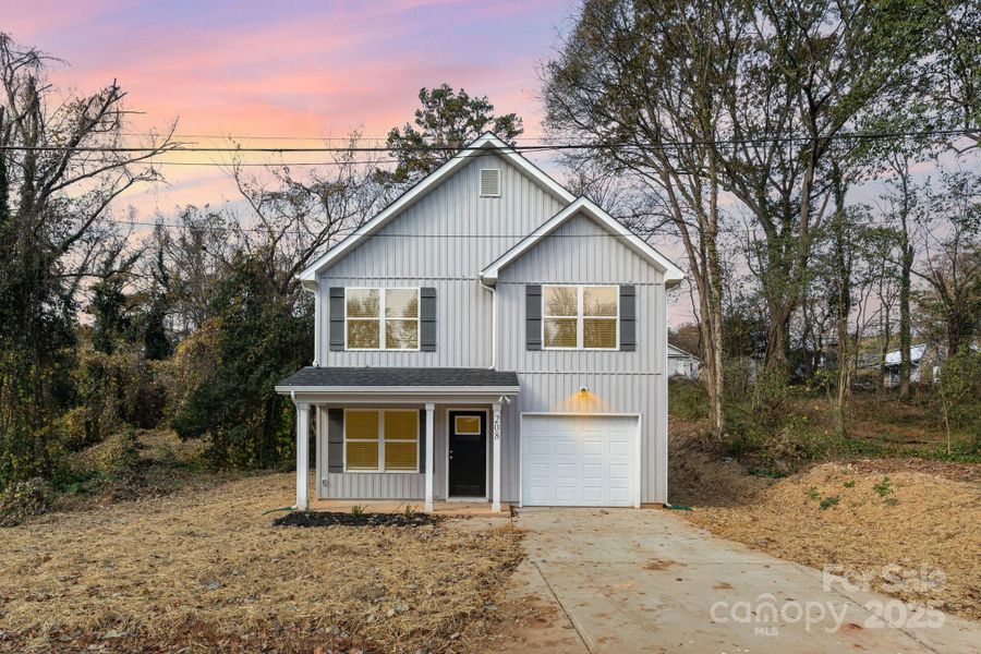 Front exterior of a new home in , Kannapolis, NC, highlighting curb appeal (Image 2). Front exterior of a new home in , Kannapolis, NC, highlighting curb appeal (Image 2).