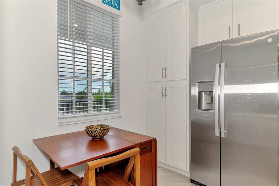 Furnished interior view inside a new home in Wellen Park Golf & Country Club, Venice (Image 15).