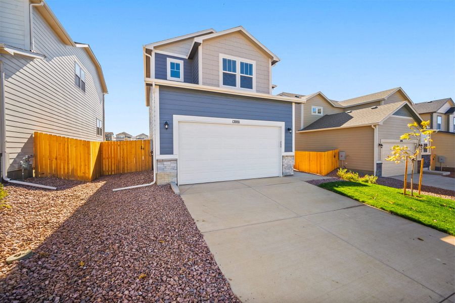 Exterior details and patio area of a home in Ridge at Lorson Ranch, Colorado Springs (Image 3). Exterior details and patio area of a home in Ridge at Lorson Ranch, Colorado Springs (Image 3).