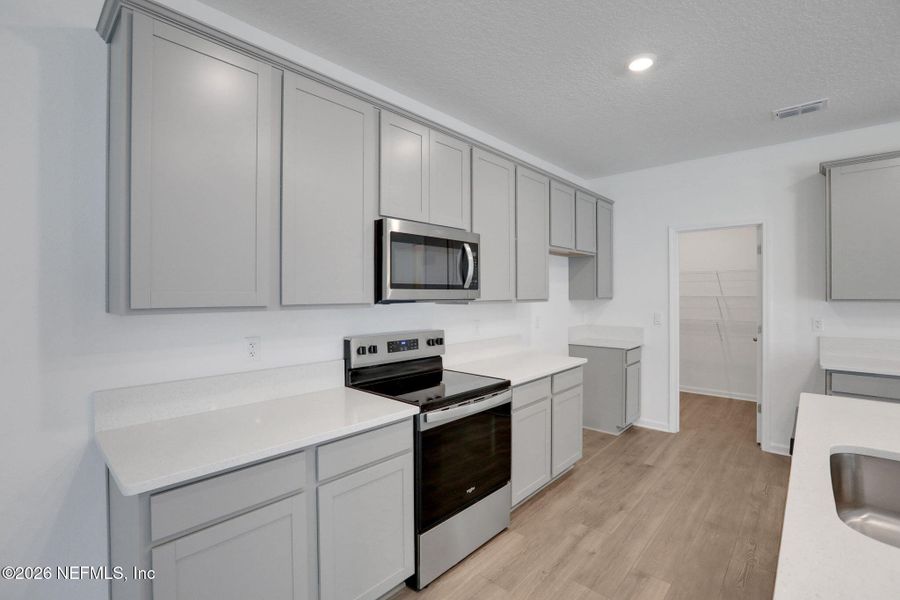 Furnished interior view inside a new home in Amberly, Green Cove Springs (Image 7).
