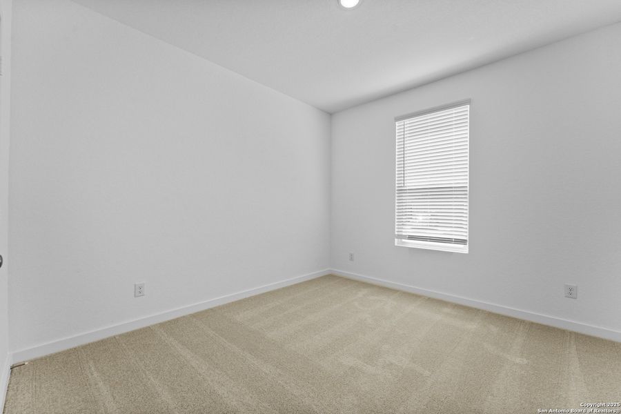 Spacious, unfurnished interior of a new home in Hidden Trails: Coastline Collection, Bulverde (Image 11).