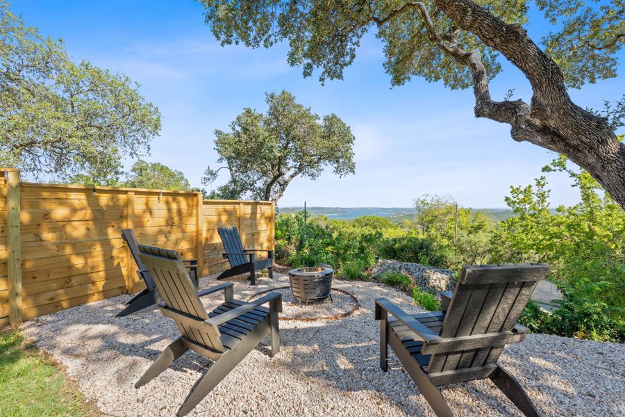 A private fire pit setting tucked beneath the trees, perfect for stargazing and water view day/nights. Special place for coffee/beverages. A private fire pit setting tucked beneath the trees, perfect for stargazing and water view day/nights. Special place for coffee/beverages.