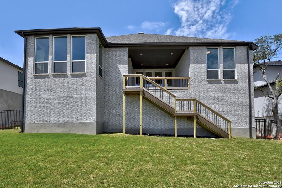 Front exterior of a new home in Esperanza, Boerne, TX, highlighting curb appeal (Image 2). Front exterior of a new home in Esperanza, Boerne, TX, highlighting curb appeal (Image 2).
