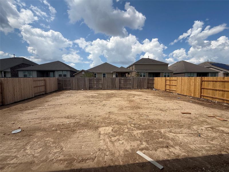 Front exterior of a new home in Berry Creek Highlands, Georgetown, TX, highlighting curb appeal (Image 15). Front exterior of a new home in Berry Creek Highlands, Georgetown, TX, highlighting curb appeal (Image 15).