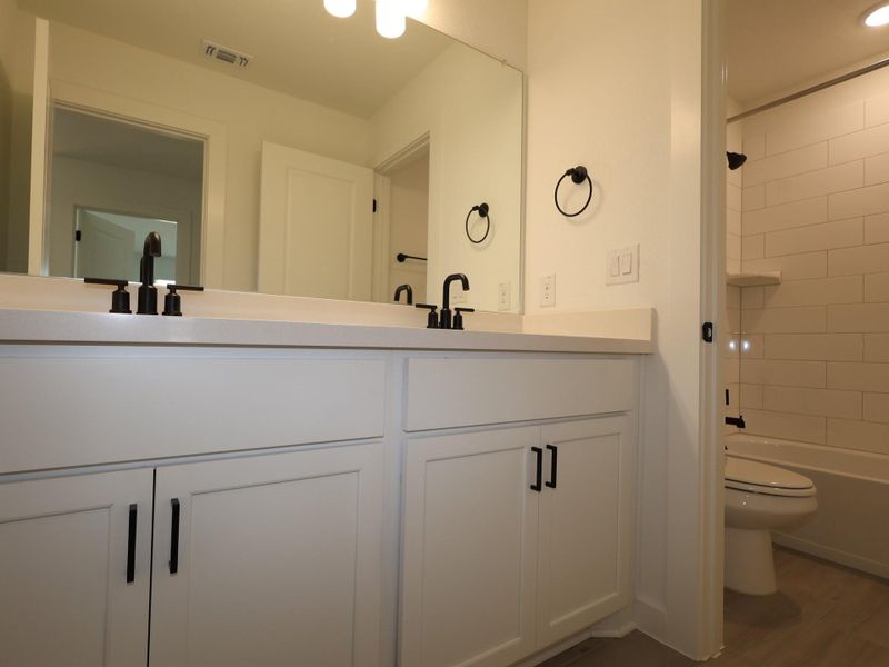 Furnished interior view inside a new home in Barksdale, Leander (Image 8). Furnished interior view inside a new home in Barksdale, Leander (Image 8).