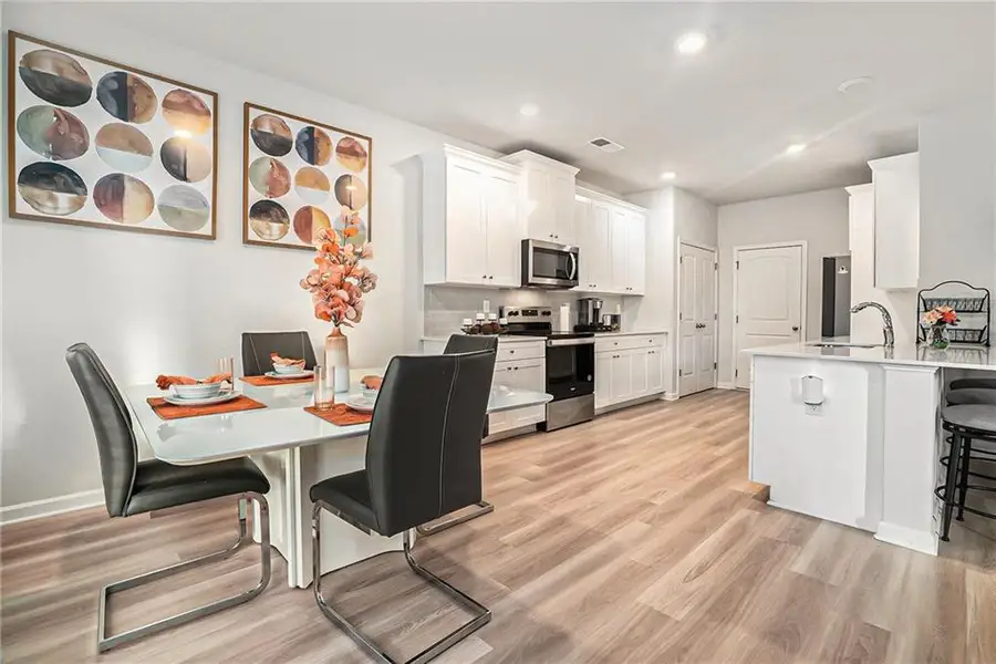Furnished interior view inside a new home in Adagio, Dacula (Image 6).