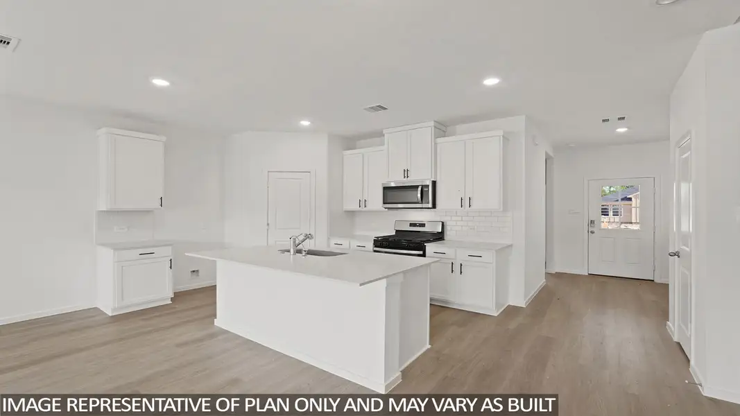 Furnished interior view inside a new home in New Waverly Station, New Waverly (Image 3). Furnished interior view inside a new home in New Waverly Station, New Waverly (Image 3).