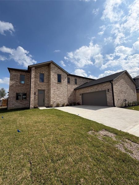 Front exterior of a new home in , Spring, TX, highlighting curb appeal (Image 16).