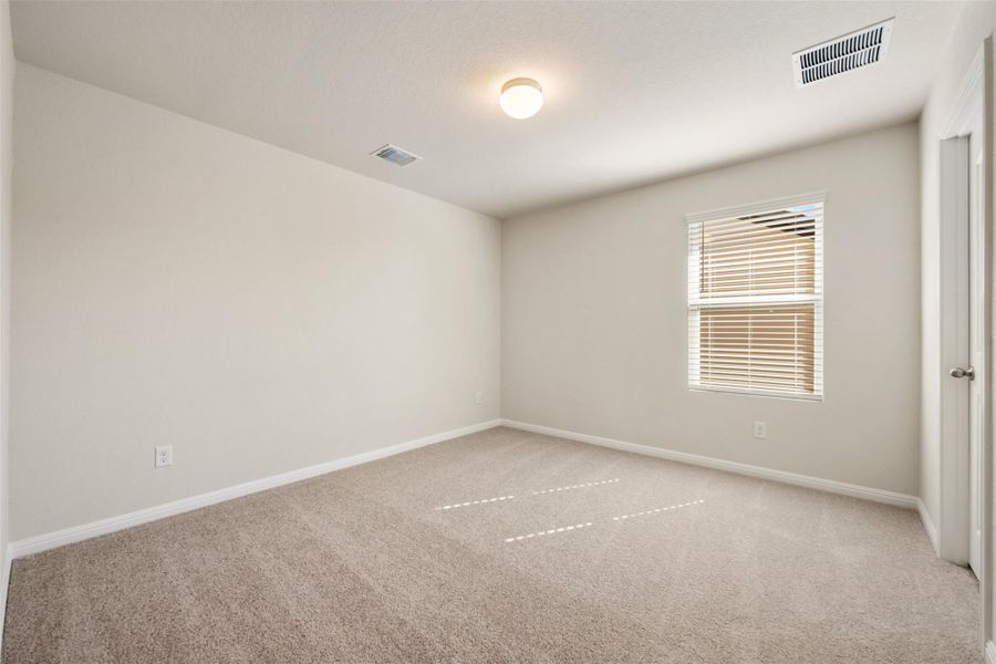 Spacious, unfurnished interior of a new home in The Colony 45s, Bastrop (Image 26).