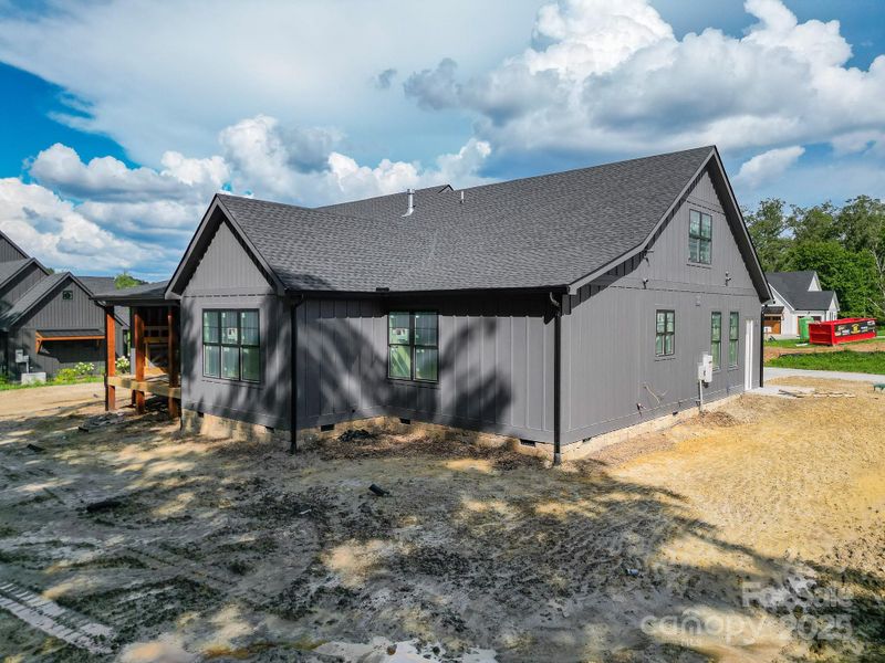 Front exterior of a new home in , Mills River, NC, highlighting curb appeal (Image 19).