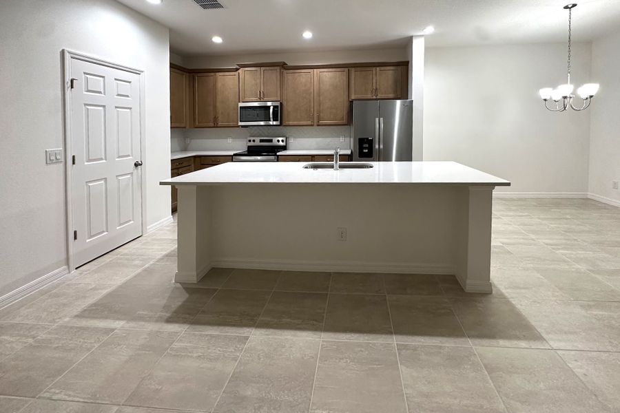 Furnished interior view inside a new home in Trinity Gardens, Deland (Image 4).