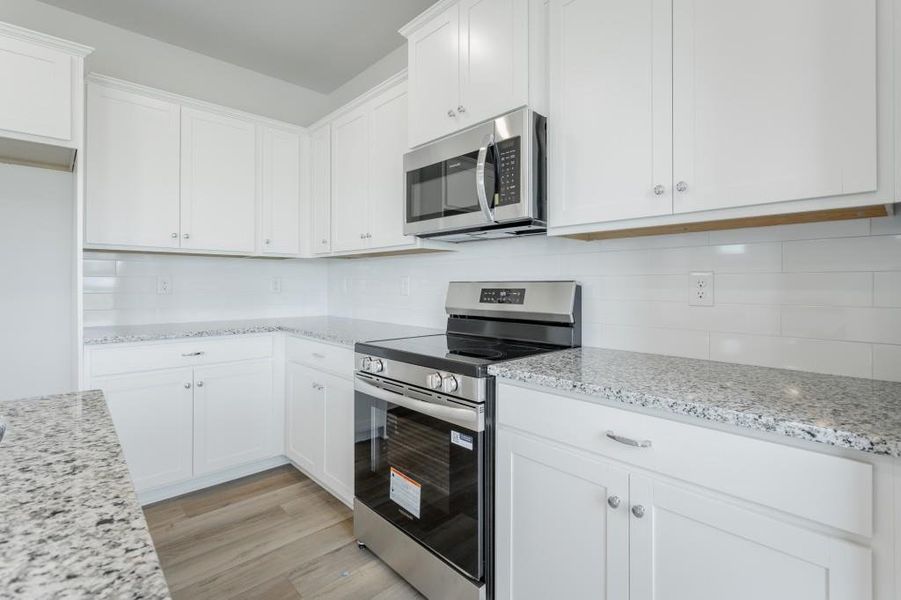 Furnished interior view inside a new home in Laurel Ridge, Rock Spring (Image 11).