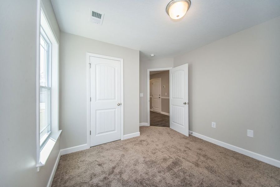 Representative unfurnished interior of a home built from the Bishop by Enchanted Homes in Ballentine Ridge, Lyman (Image 21).
