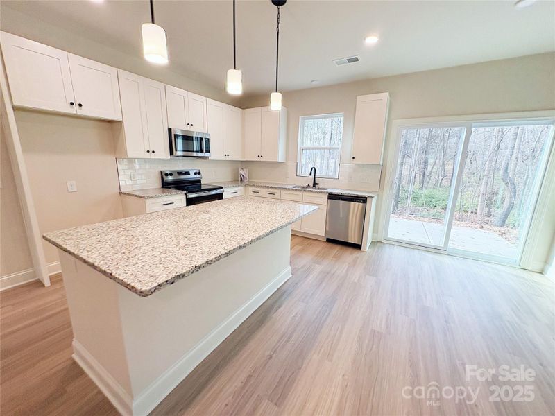 Furnished interior view inside a new home in , Statesville (Image 6).