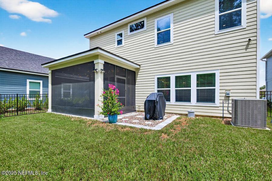 Front exterior of a new home in Tributary, Yulee, FL, highlighting curb appeal (Image 19).
