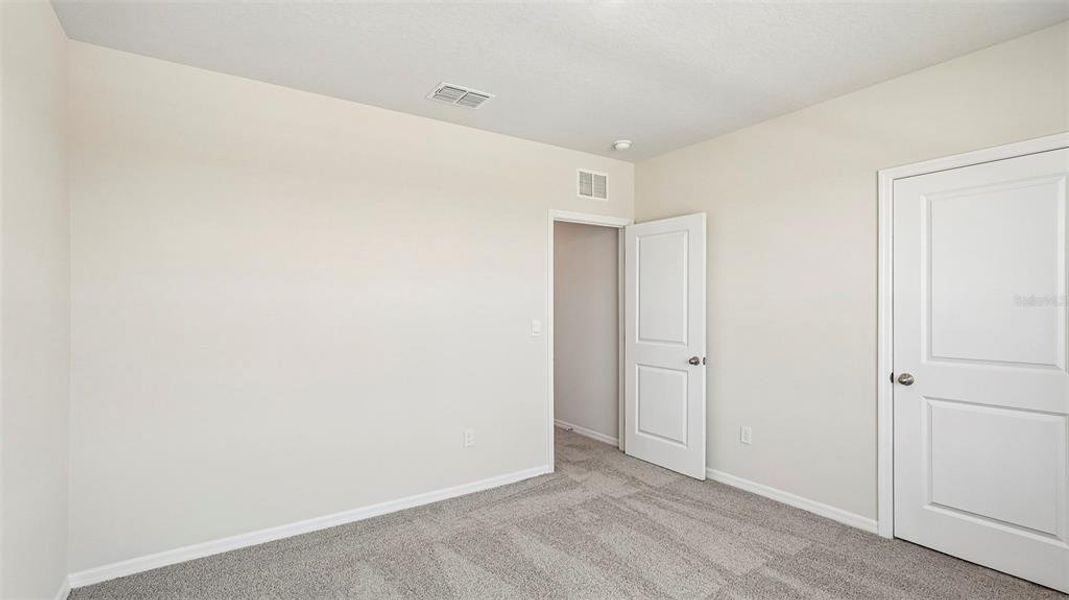 Spacious, unfurnished interior of a new home in Bella Lago, Parrish (Image 28).