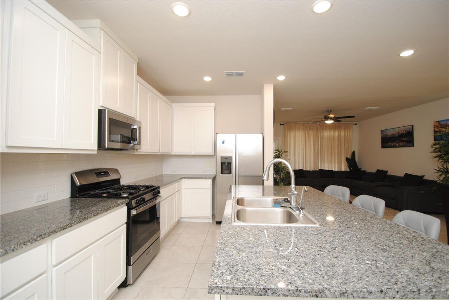 Furnished interior view inside a new home in Mason Woods, Cypress (Image 14).