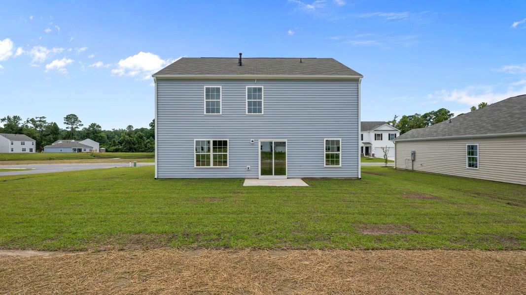Front exterior of a new home in Madeline Farm, New Bern, NC, highlighting curb appeal (Image 16).
