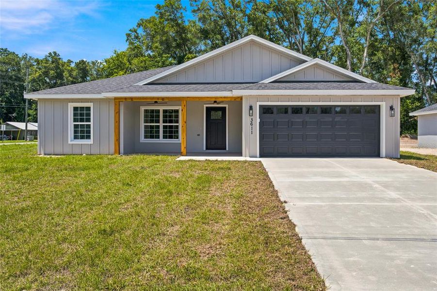 Front exterior of a new home in , Summerfield, FL, highlighting curb appeal (Image 21).