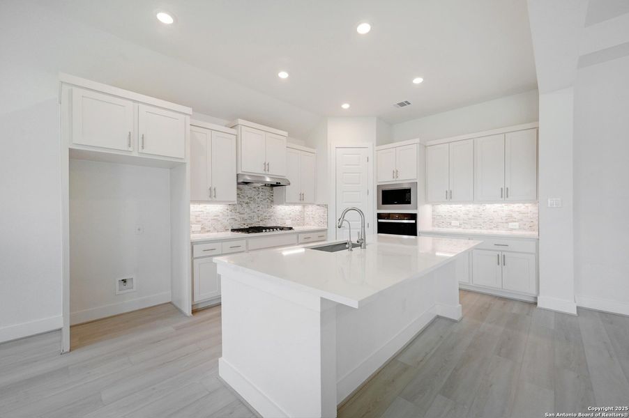 Furnished interior view inside a new home in The Grove at Vintage Oaks, New Braunfels (Image 5).