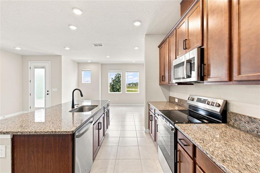 Furnished interior view inside a new home in , St. Cloud (Image 4).