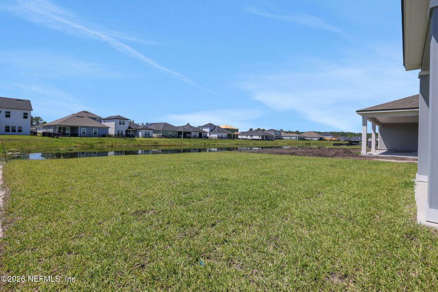 Exterior details and patio area of a home in Hyland Trail, Green Cove Springs (Image 28).