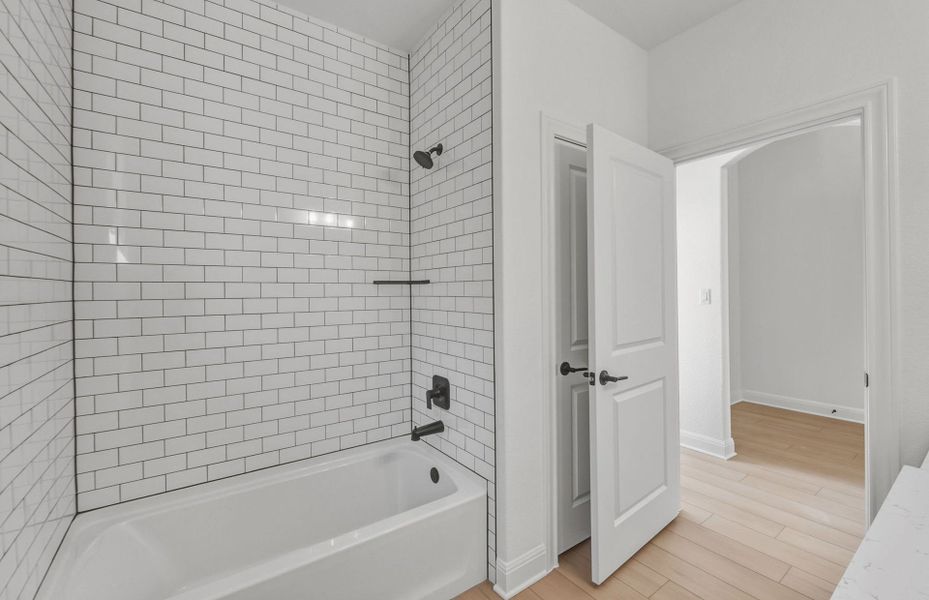 Furnished interior view inside a new home in West Cypress Hills, Spicewood (Image 16).