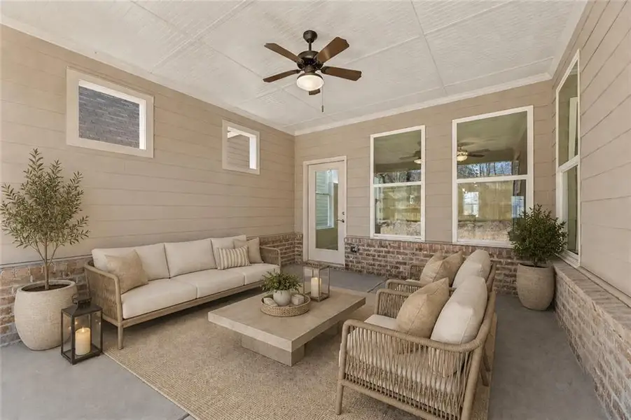 Exterior details and patio area of a home in Cooper's Walk, Loganville (Image 3).